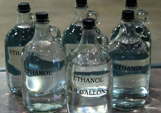 Спирт в больших бутылках